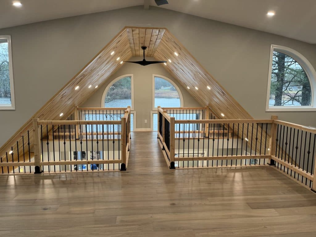 Attic converted into an open loft with wood ceiling